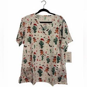 GT PERFORMANCE WOMEN 2X
CHRISTMAS SCRUB TOP V-NECK NWT (MINOR FLAW ON POCKET)